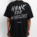 Oversized 'Honk For Wheelies' Tee for Motorcycle & Streetwear Enthusiasts - Loose Fit with Wide Arm Holes, Drop Shoulder Design, Comfortable and Durable Biker T-Shirt Celebrating Riding Culture and motorcycle rider gift ideas.